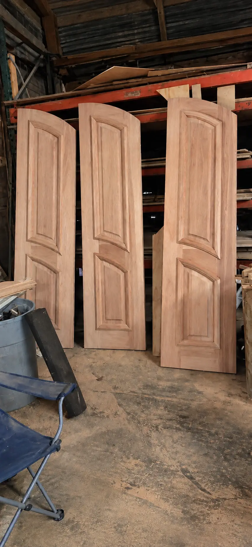 Custom Arched Mahogany Doors Built to Make an Entrance